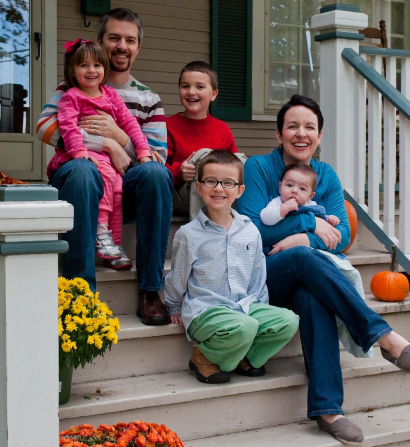 Hassler with his family in 2012. The two youngest kids were then in foster care.