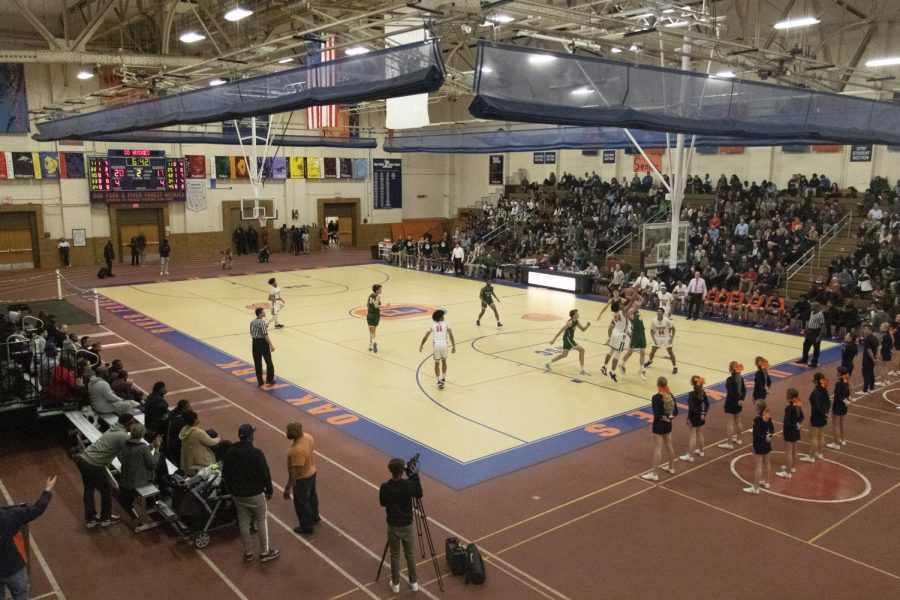 The boys basketball team playing during their last season, in January of 2020