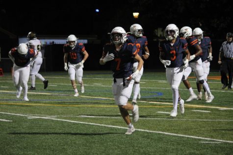 Senior captain Owen Detmer jogging off the field