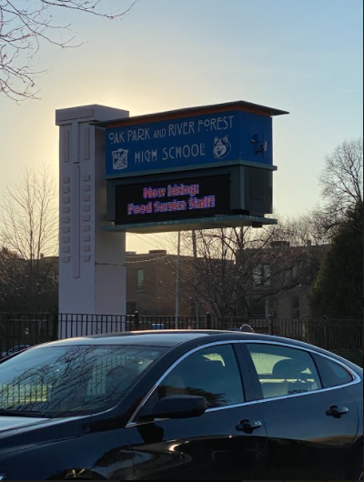 A Help Wanted sign in front of the Lake Street Track