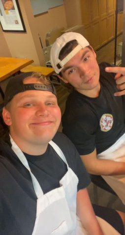Photo courtesy of Gabe Kedziora, Gabriel Kedziora (left) on duty at Billy Bricks Wood Fired Pizza