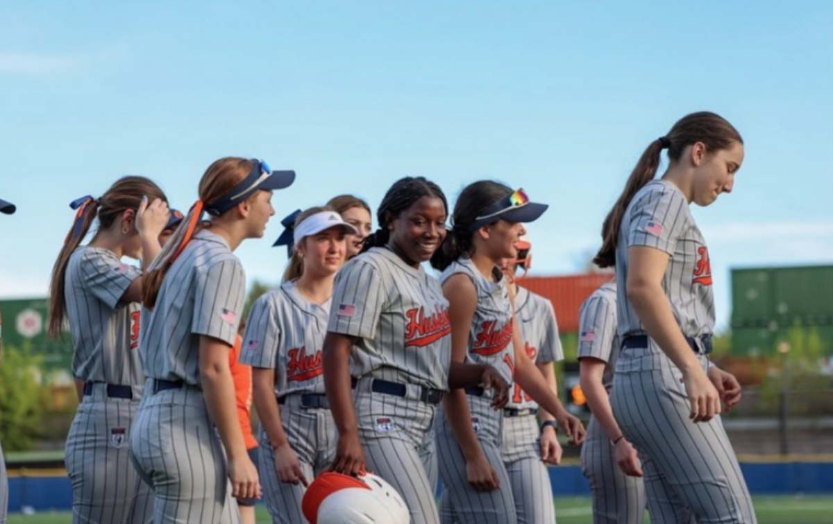  Softball players celebrating win