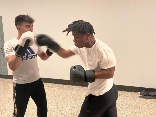 Students practicing at the first boxing club meeting of the year.