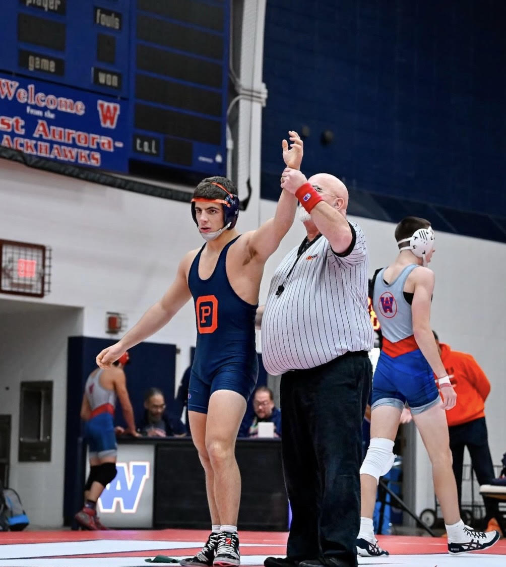 Knackstedt winning his match at the West Aurora Dual