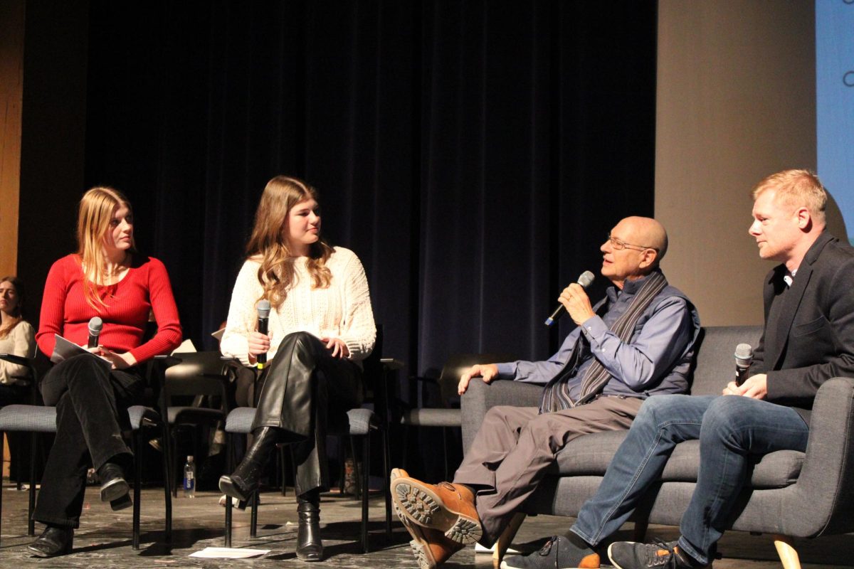 Alice Cadwell and Caroline Vietzen speaking with Dan Halperin