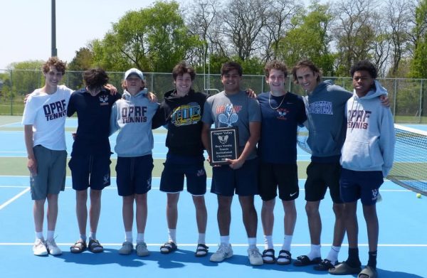 Boys tennis players pose after a recent tournament. 