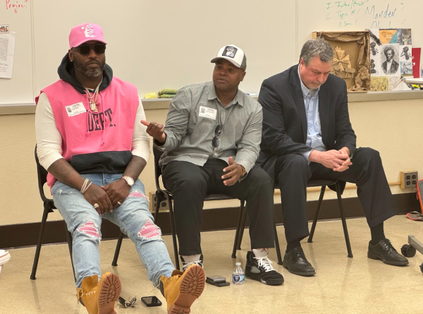 Exonerated prisoners LaRod Styles (left) and Charles Johnson (center)  with their attorney, Terry Campbell. They spoke at Oak Park and River Forest High School on May 12.
