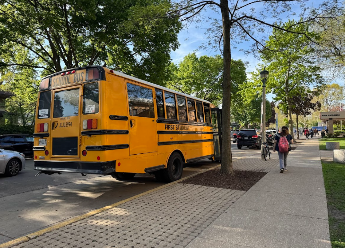 A bus pulls up outside Door 5, the entrance for special education students at Oak Park and River Forest High School.