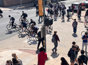 Student cyclists head out after a school day.