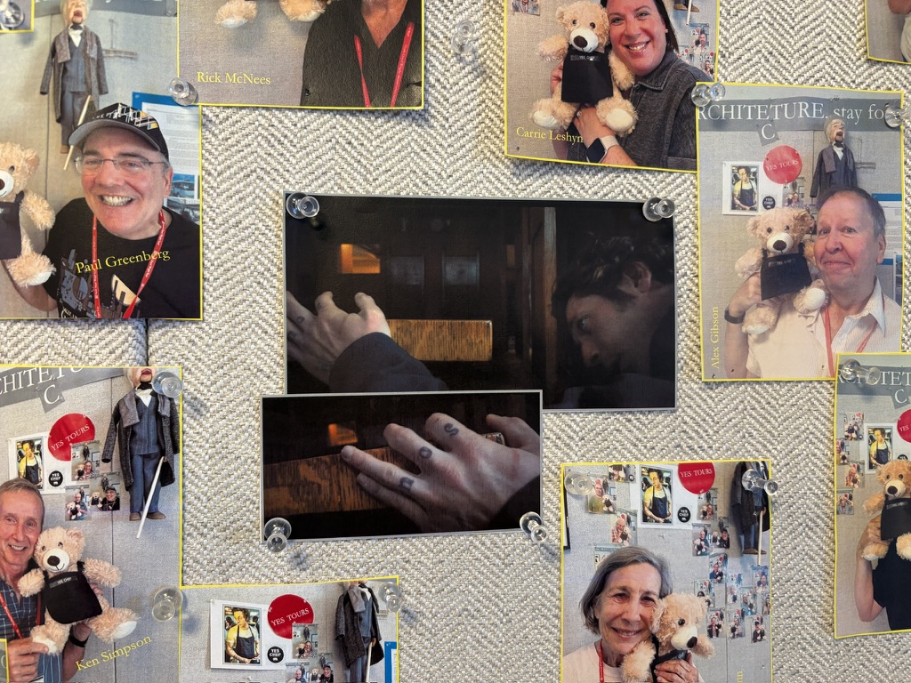 A bulletin board displays mementos from "The Bear" at the Frank Lloyd Wright Home and Studio
