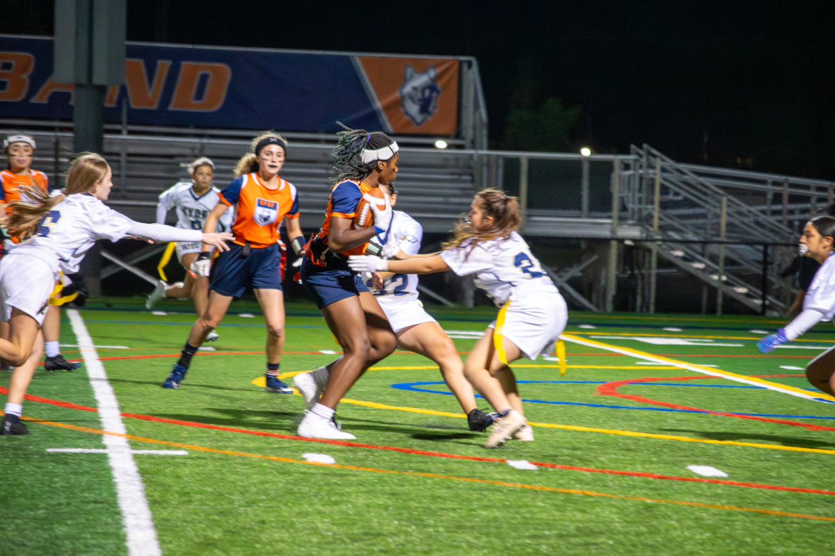 Senior Cora Brown handles the ball for OPRF's flag football team in a recent game.