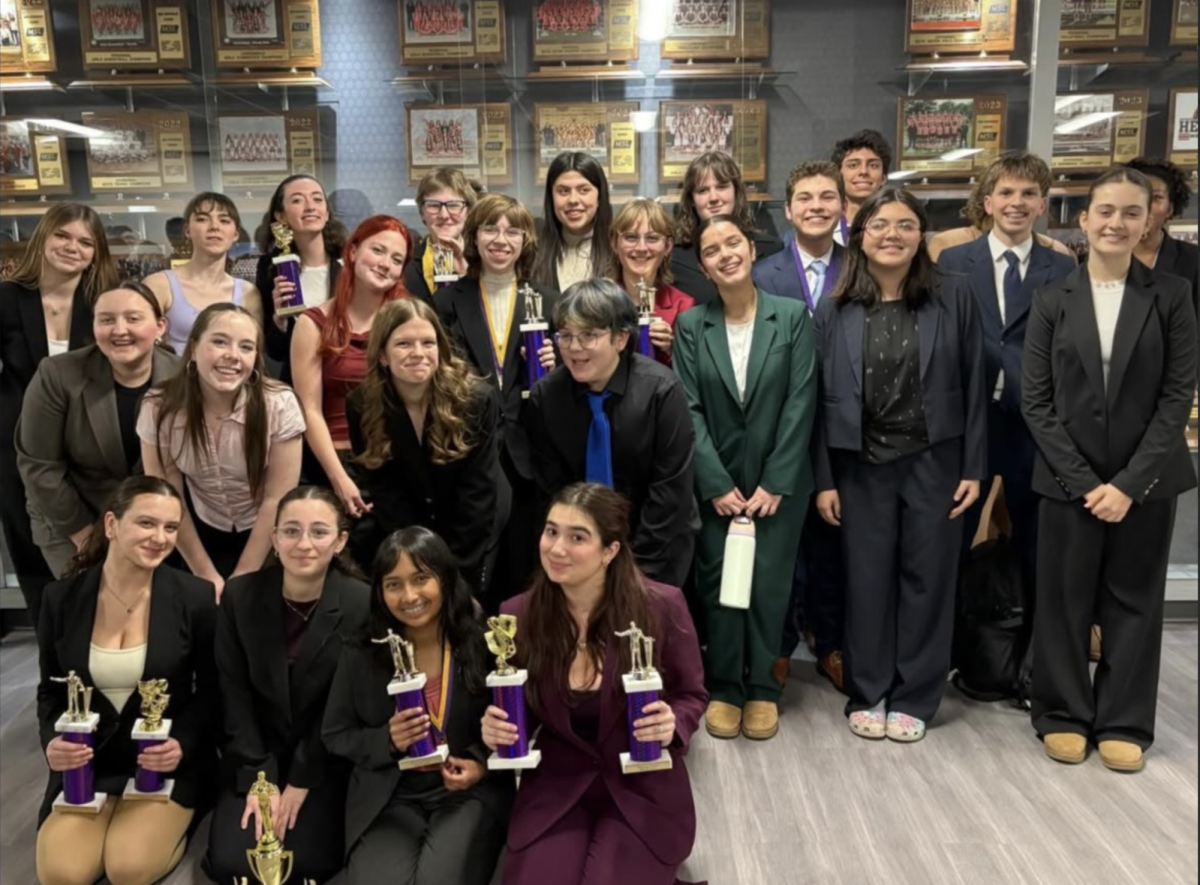  Speech team members at the South Elgin tournament in December 2025. Photo courtesy of @oprfhsspeechteam on Instagram