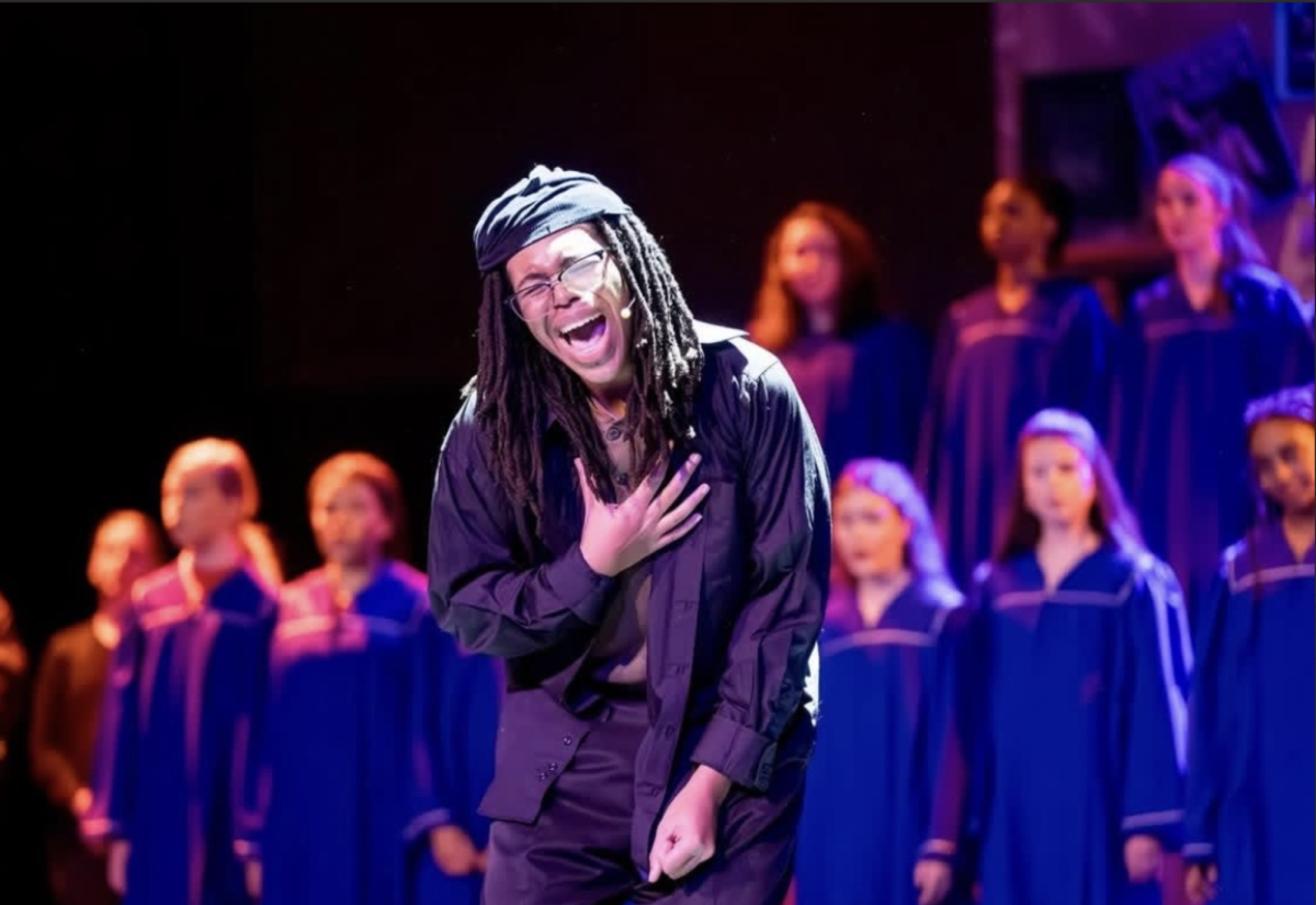 Micah Merrill on stage during "Rent"